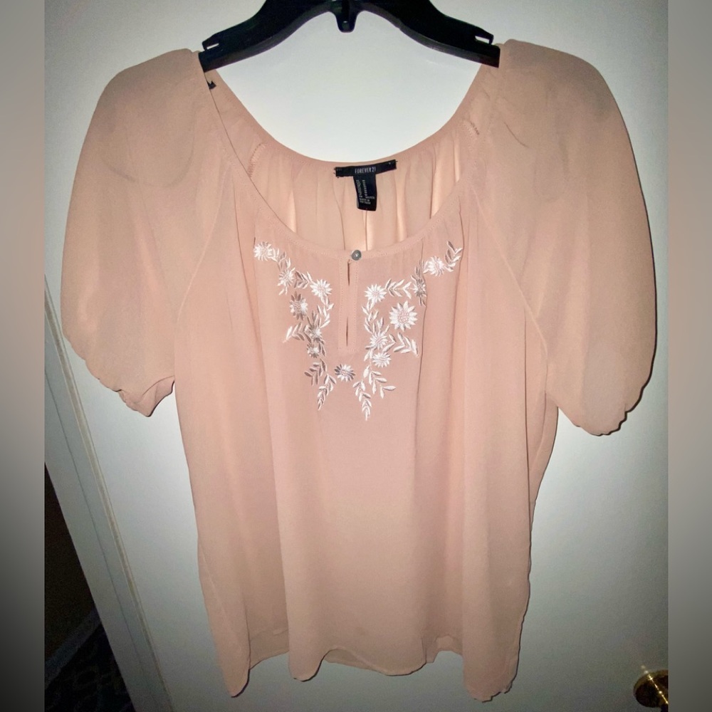 New with tags, peach colored blouse. NWT